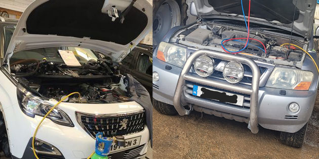 Image of and air conditioning unit being serviced on a Massey Ferguson tractor 
